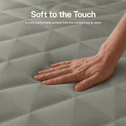 Close-up of a comfortable inflatable sleeping pad with soft quilted surface designed for rooftop tent camping