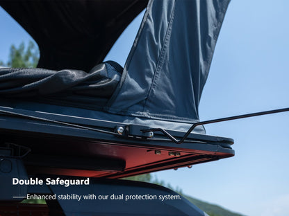 Close-up view of TOPOAK Nebula rooftop tent showing its double safeguard locking system for enhanced stability and safety.