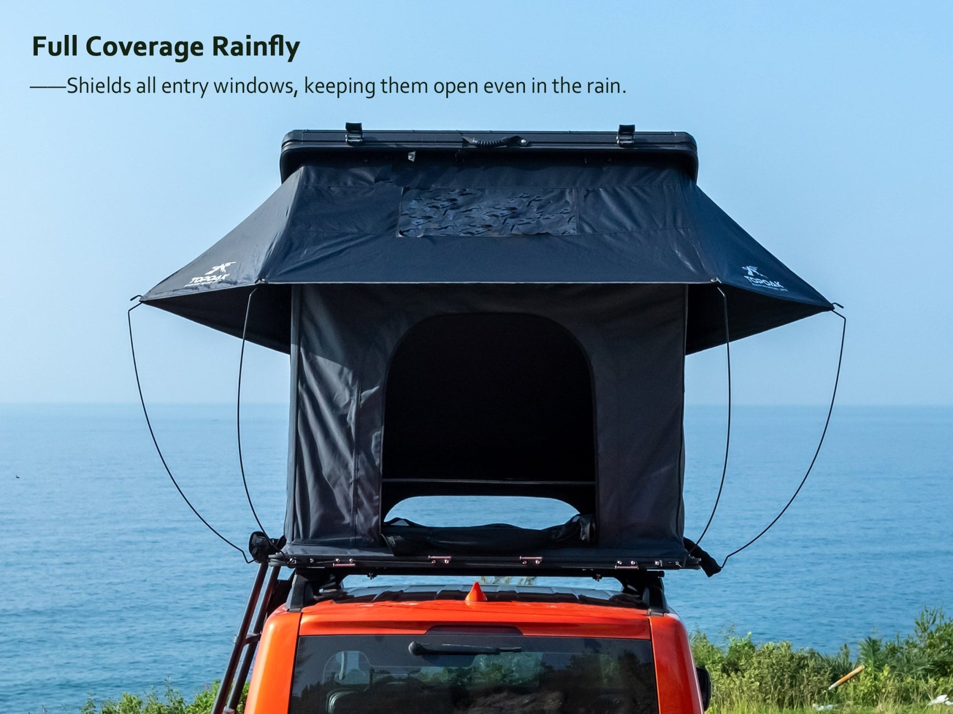 TOPOAK Nebula rooftop tent equipped with a full coverage rainfly for complete waterproof protection in heavy rain.